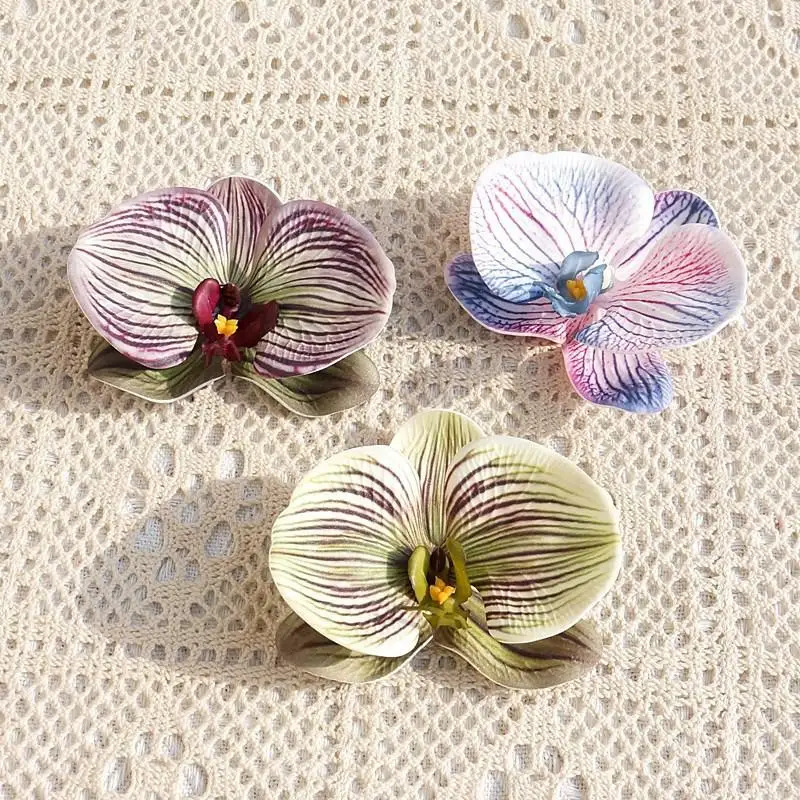 Tocado de orquídeas y mariposa - Wedding Souvenir reseña y precio